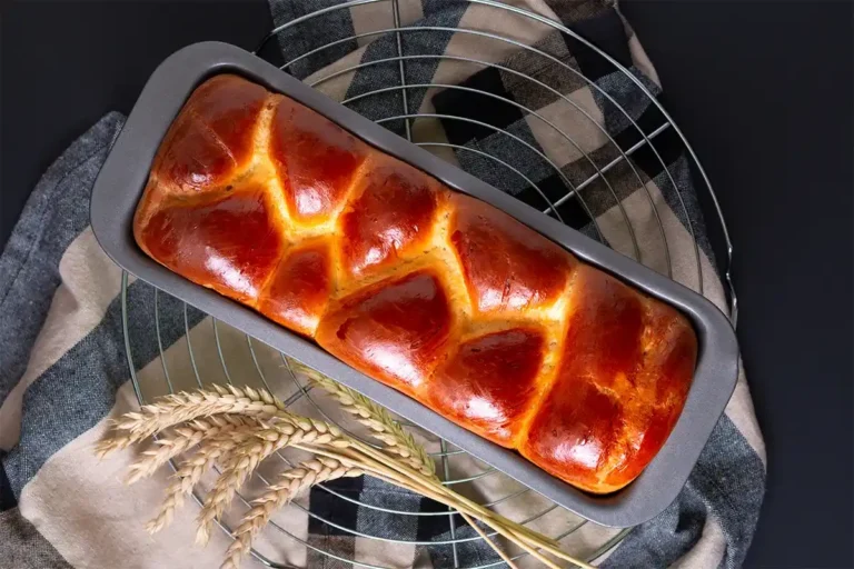 Golden brioche loaf with a soft, buttery crust and fluffy interior